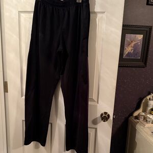 Under Armour women’s Black Joggers with silver accents on bottom side of legs